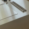 Flat Lay von Modulum Basis-Modul in Edelstahl auf Edelstahl Couchisch Brushed Q